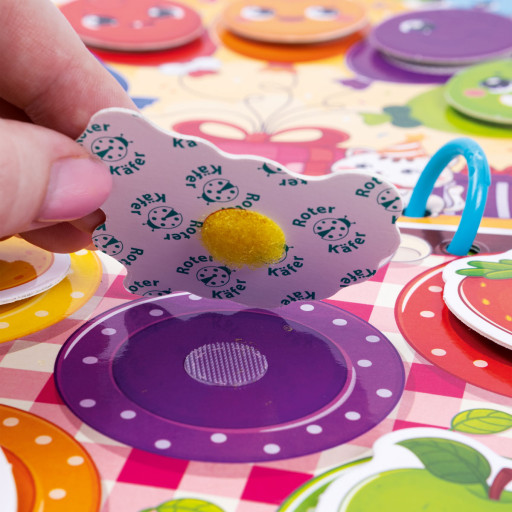 Zajęta książeczka zapinana na rzep. Emotikony.